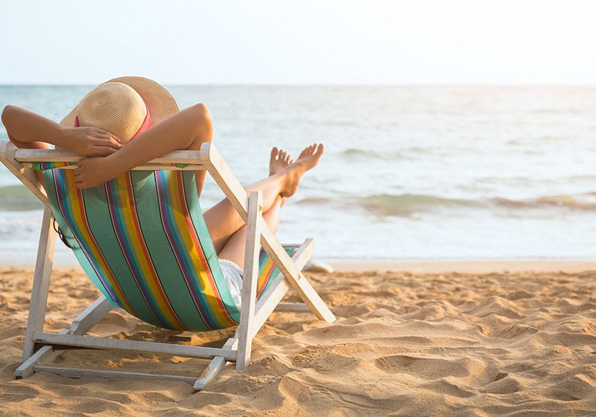 Relaxing on a deckchair on the beach